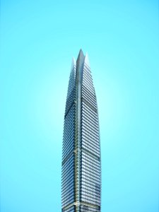 gray high-rise building under blue sky