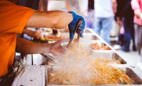 A man serving street food in Letchworth Garden City