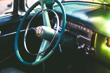 vintage green vehicle steering wheel photo