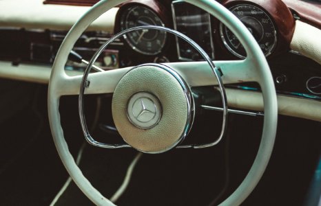 teal Mercedes-Benz vehicle steering wheel photo