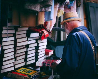 man holding book
