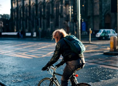 man riding on bicycle photo