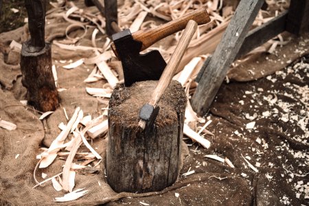 two axe on wood photo