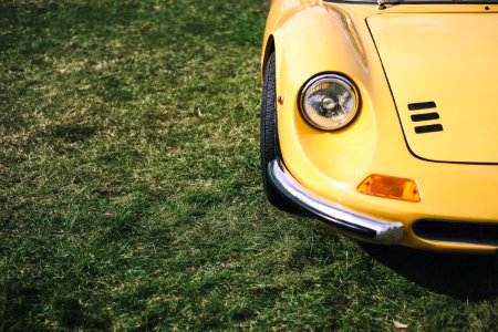 yellow car showing headlight photo