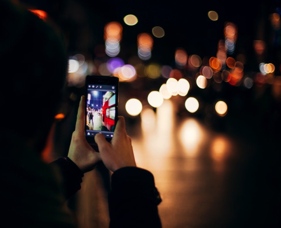 person holding black Android smartphone photo