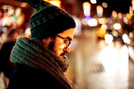 man looking down on side on the street photo