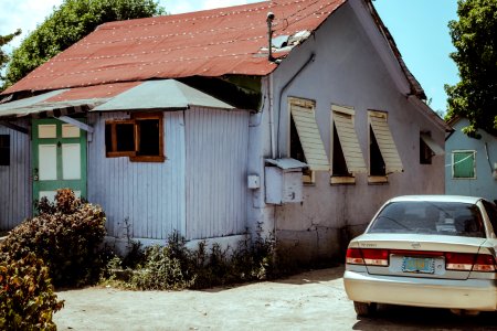 white car park near house