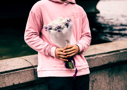 person holding bouquet of flowers photo
