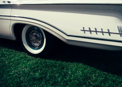 close-up photo of chrome wheel with tire