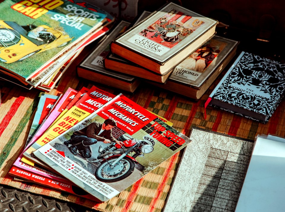 assorted-title books on mat