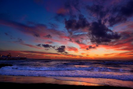 ocean waves near seashore during golden hour photo