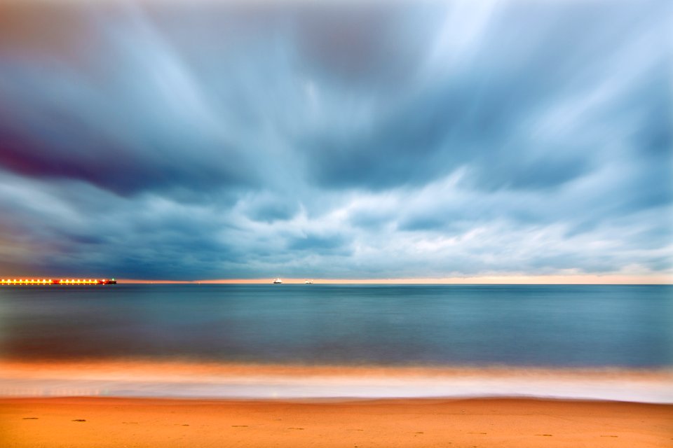 blue sky and body of water power