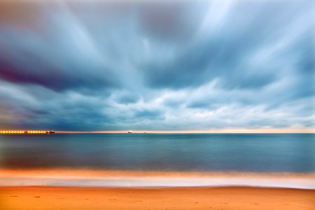 blue sky and body of water power