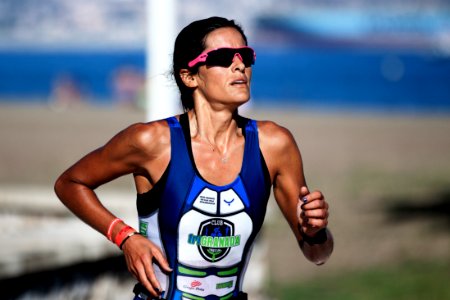 selective focus photography of woman running photo