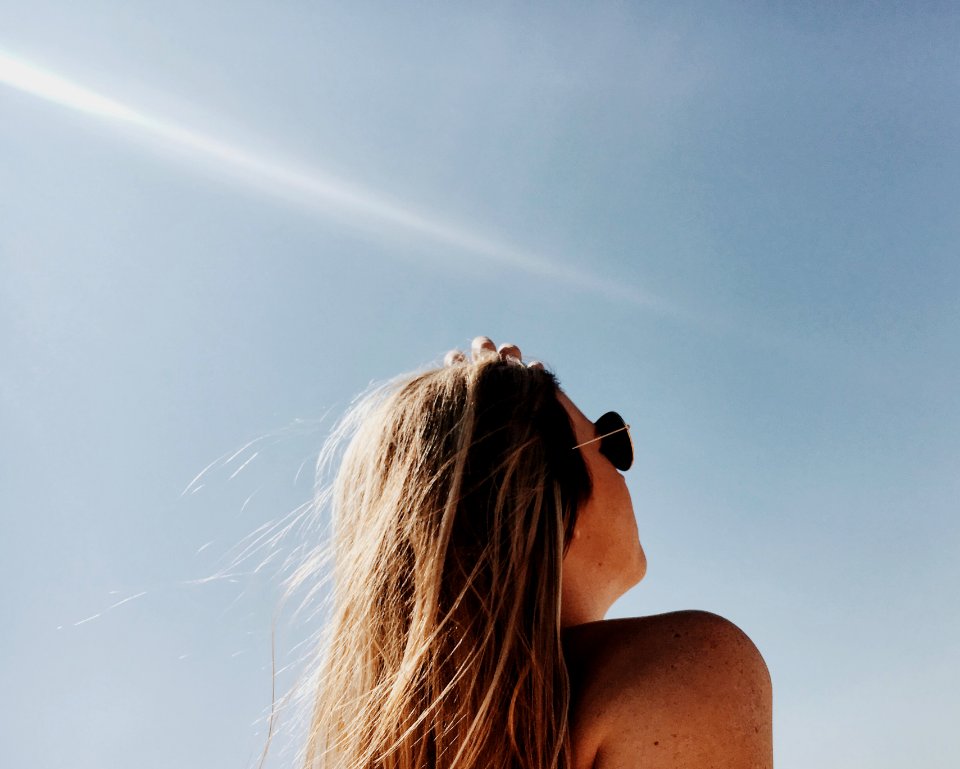 woman wearing gold framed Aviator sunglasses photo