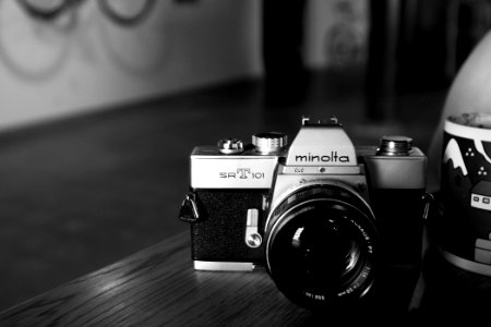 Minolta SLR camera on table
