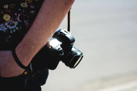 person carrying bridge camera