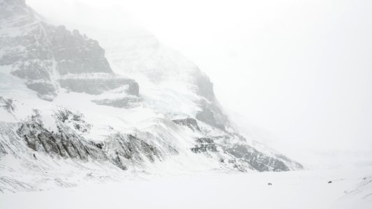 snow covered mountain during daytime