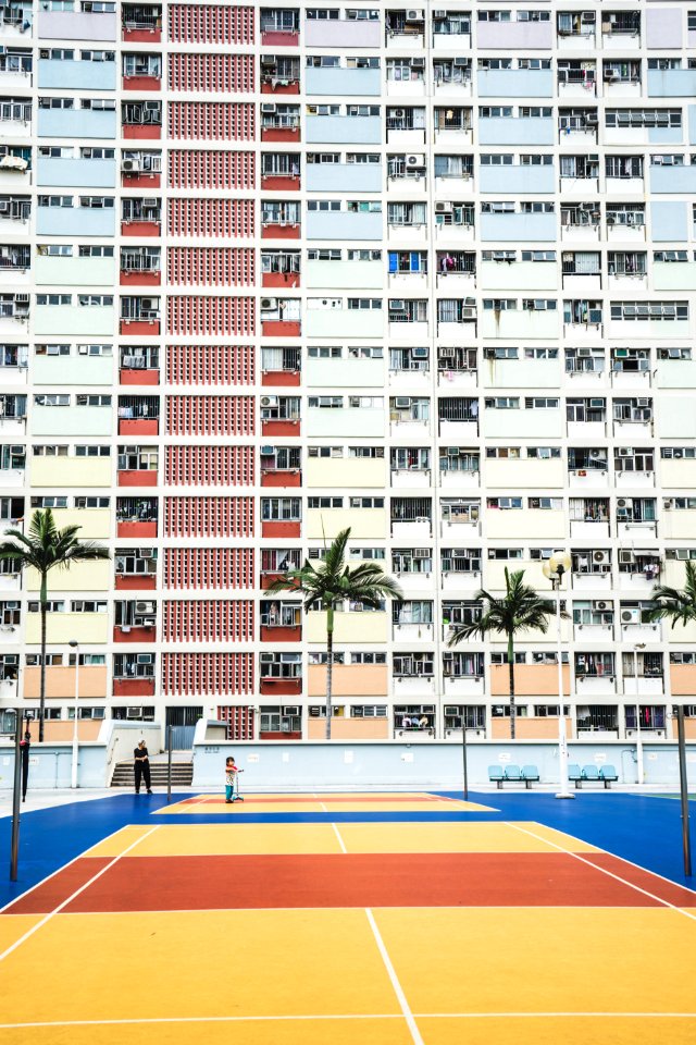 white wall paint high-rise building during daytime