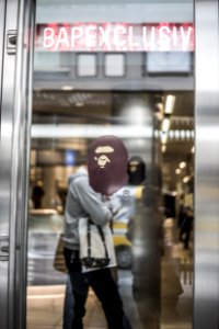 A Bathing Ape decal on glass