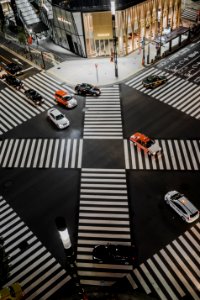aerial view photo of vehicles crossing road