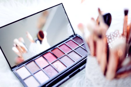 selective focus photography of eyeshadow palette photo