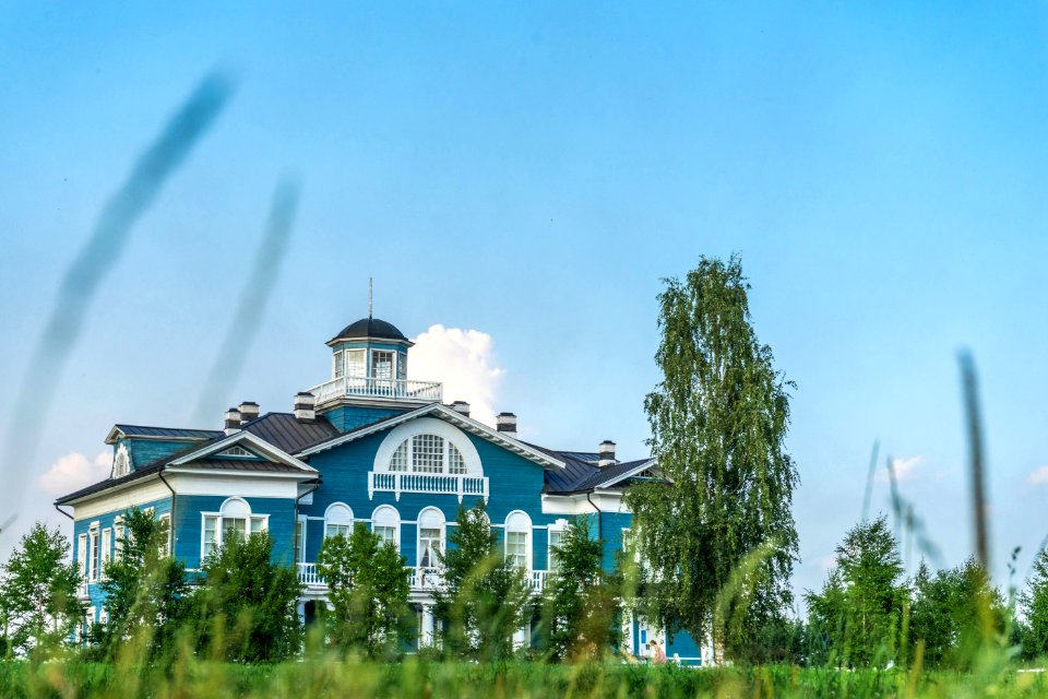 photo of white and blue house