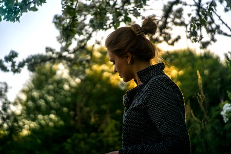 selective focus photography of woman wearing black jacket