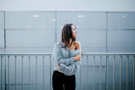woman in gray sweater photo