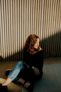 woman sitting on ground photo
