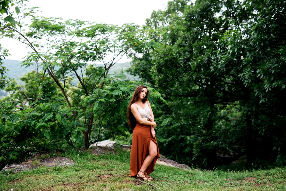woman standing near plants