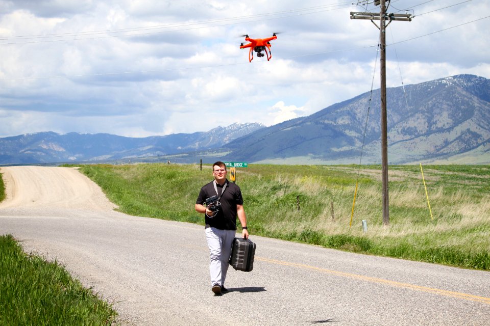 Road, Mountains, Man walking with drone