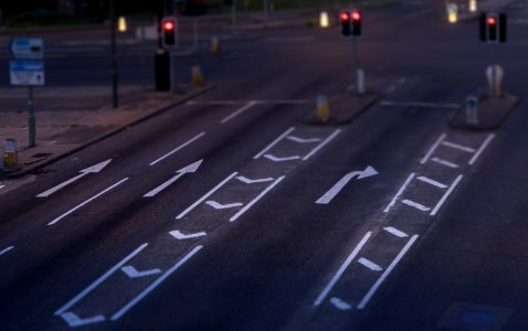 photo of empty gray road with traffic light photo