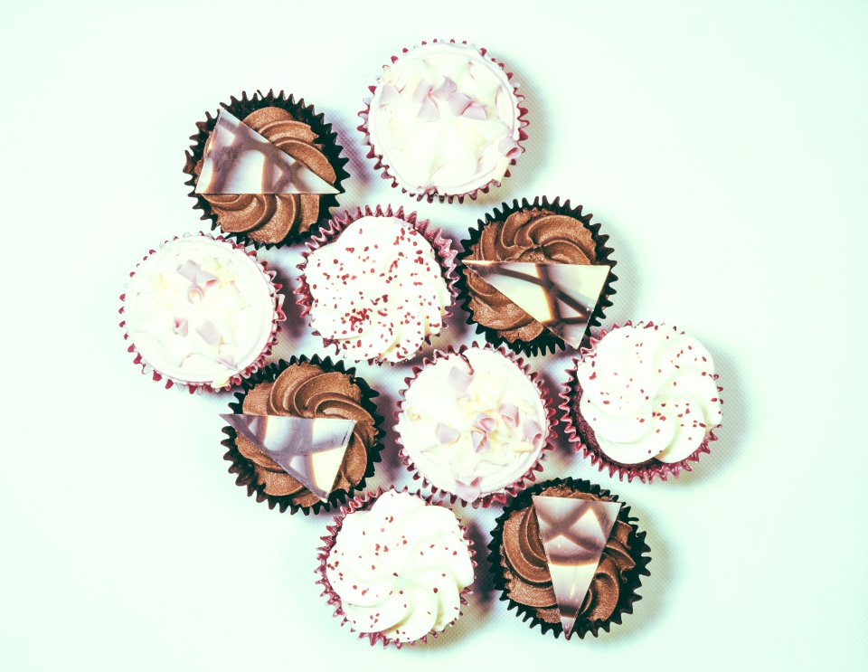 assorted cupcake lot on white surface