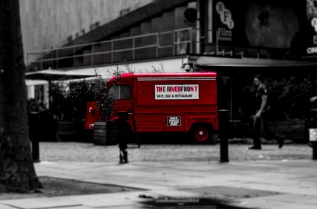 selective color photo of red van