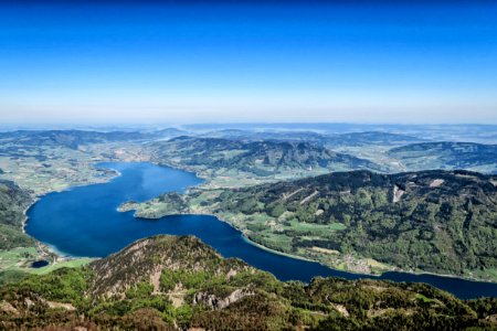 aerial photography of island and lake at daytime photo