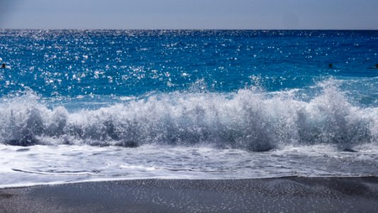 ocean waves on beach shore during daytime photo
