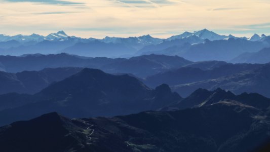 black and white mountains under white sky during daytime