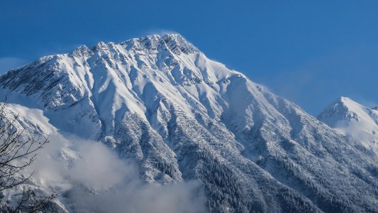 photography of snow capped mountain during daytime photo