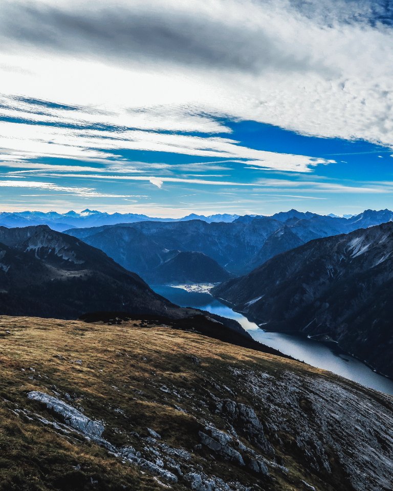 green and brown mountains under blue sky during daytime photo