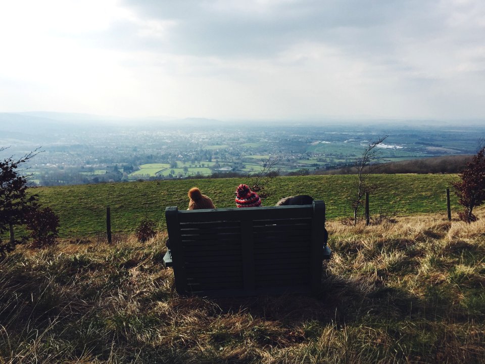 two children sitting on bench