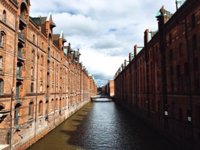 body of water surrounded by concrete structures photo