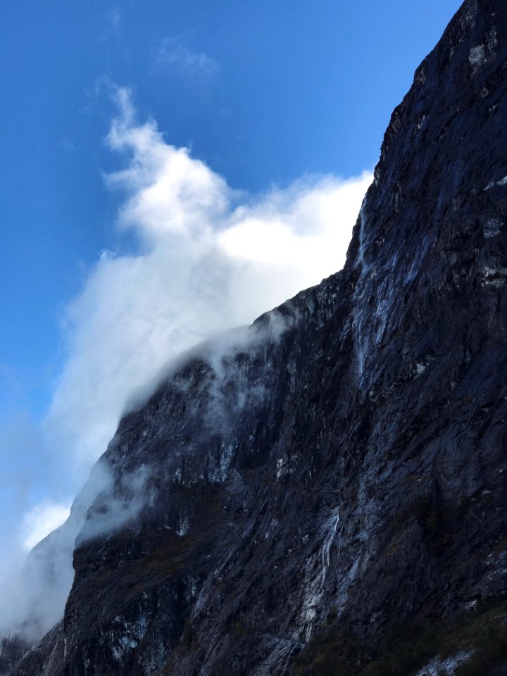 grey mountain under blue sky