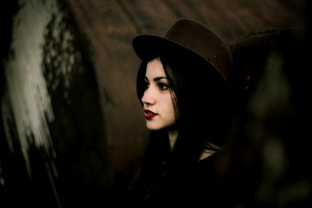 woman wearing black hat