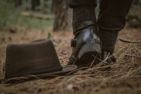 brown bucket hat on ground close-up photography photo