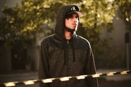 man in black zip-up hoodie photo