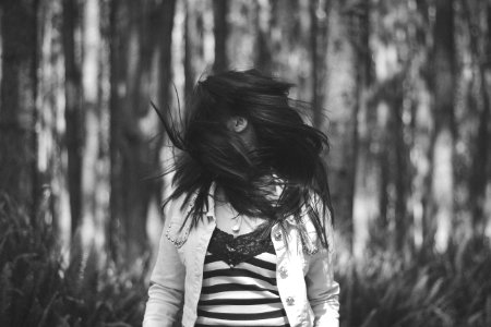 woman near plants photo