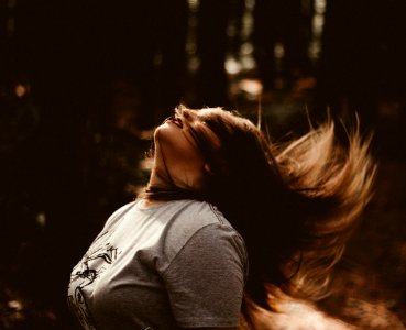 woman flipping her hair photo