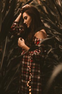 woman standing on grass field photo