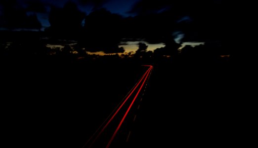time lapse photography of vehicle light photo